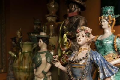 2-MOIFA_Espinar_03: The Ladies, grouping of ceramic figurative candlesticks and pitchers from Sicily, Peru and France.
