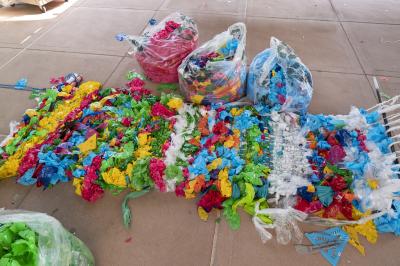 2-MOIFA-Gallery of Conscience Aymar Ccopacatty’s trash loom at MOIFA during the Arts Alive program, August 2nd 2018 Photographer: Chloe Accardi 