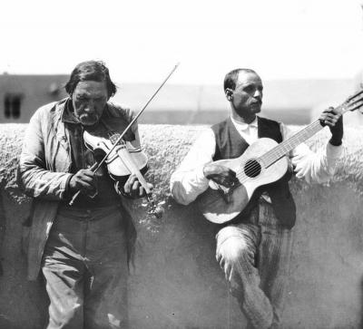 Tiburcio Ulibarri on violin and is brother Dionisio Ulibarri on guitar, New Mexico, early 20th c.